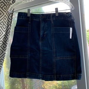 Old Navy Denim Skirt. NWT. Waist 14”, Length 16-1/2”.